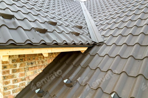 Preview: Close up of new house roof structure covered with metal tile sheets