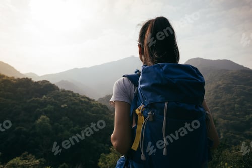 Preview: Hiker with backpack in the nature