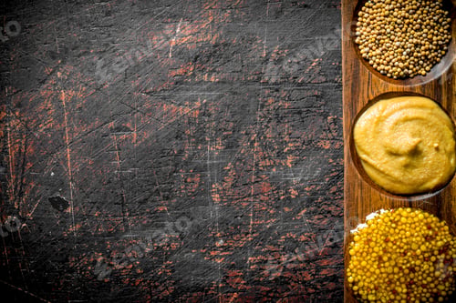 Preview: Mustard in a wooden stand.