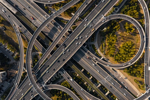 Preview: Aerial drone view of a traffic on a road junction in Wuhan on a sunny day