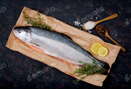 Preview: Fresh raw salmon red fish on a dark background. Flat lay. Top view