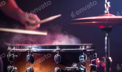 Preview: The drummer plays the drums.