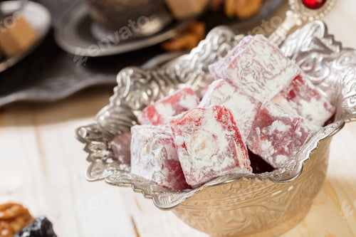 Preview: Turkish delight on a wooden table.