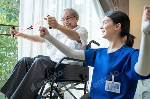 Preview: Asian Disabled senior elderly man on wheelchair do physiotherapist with support from therapist nurse