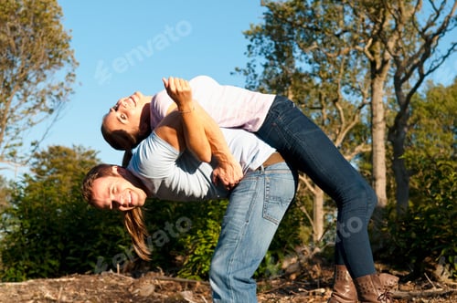 Preview: Couple playing together in park