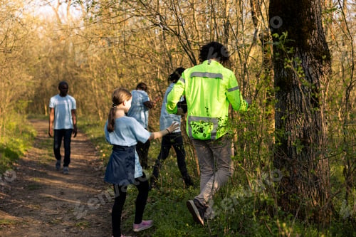 Preview: Captain of the rescue party directs his team through the forest to find details
