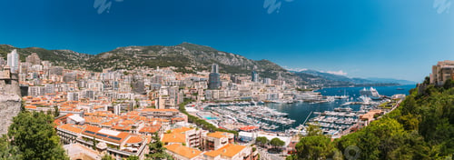Preview: Monaco, Monte Carlo cityscape. Real estate architecture on mountain hill background. Many high-rise