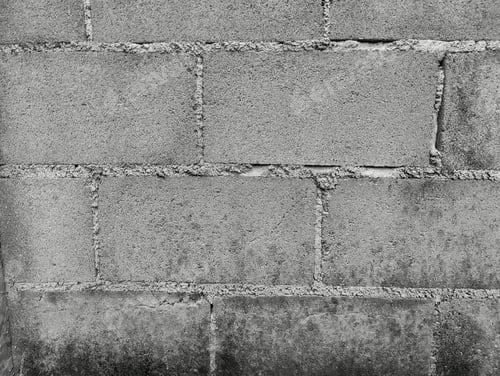 Preview: Close-up of White cement crack block wall and peeled paint caused by water and sunlight.
