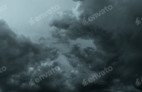 Preview: Dark dramatic sky and clouds. Background for death and sad concept. Gray sky and fluffy white clouds