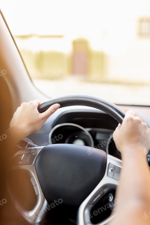 Preview: Woman driving a car