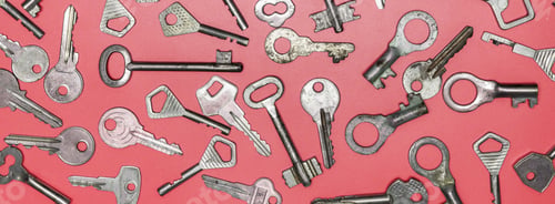 Preview: Keys set on pink background. Door lock keys and safes for proper