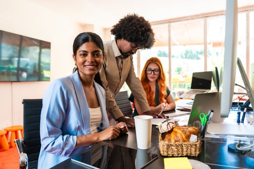 Preview: Multiethnic small group of businesspeople meeting in a coworking company office