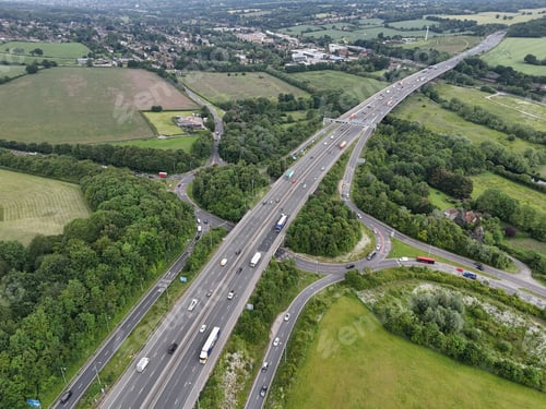 Preview: Aerial view of a busy highway interchange in Kings Langley, London.