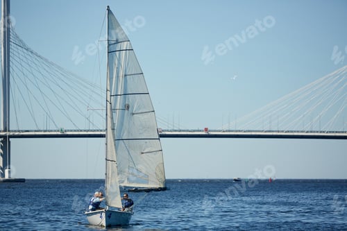 Preview: Travelers enjoying sailing on river