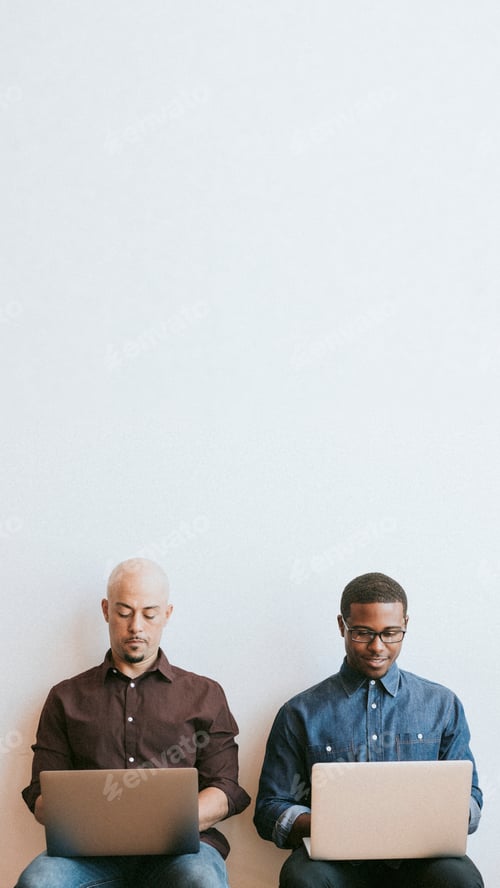 Preview: Men working on laptops