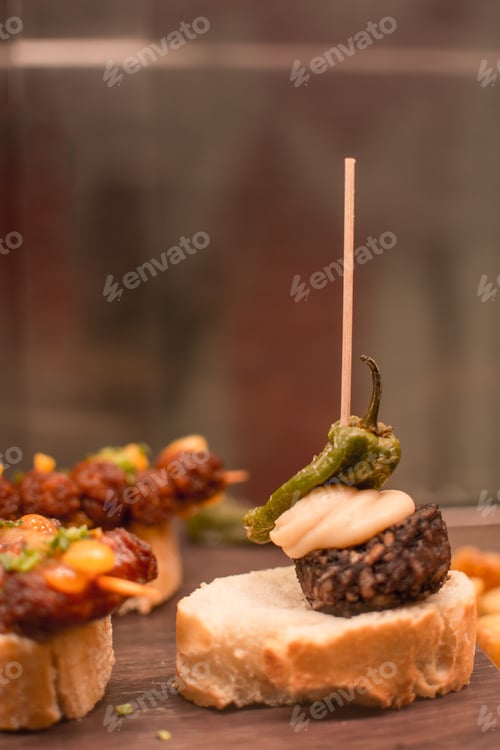 Preview: a tray of food with a sandwich and meat on it.