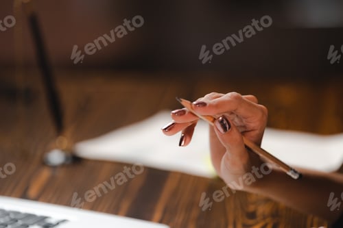 Preview: Asian businesswoman reviewing document reports and Signing Contract at office workplace