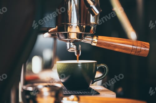 Preview: Close-up of espresso pouring from coffee machine. Professional coffee brewing