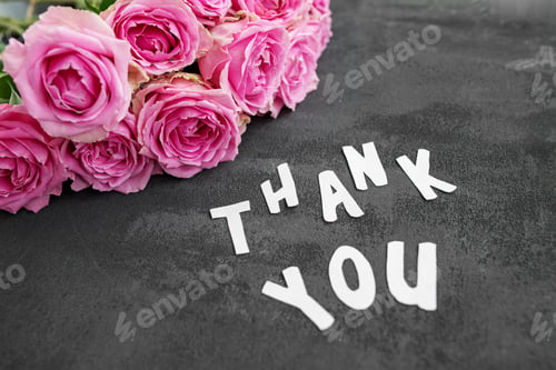 Preview: Thank you message on gray background with flowers. Background for postcard.