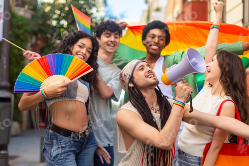 Preview: Young activists protesting for lgbtq plus rights using megaphone and rainbow flags