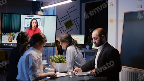 Preview: Diverse multi-ethnic business teamwork having online videocall conference meeting