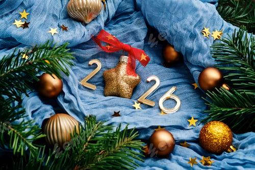 Preview: New Year's background with the number 2026 on a blue background.