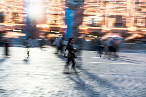 Preview: People walking fast on the street