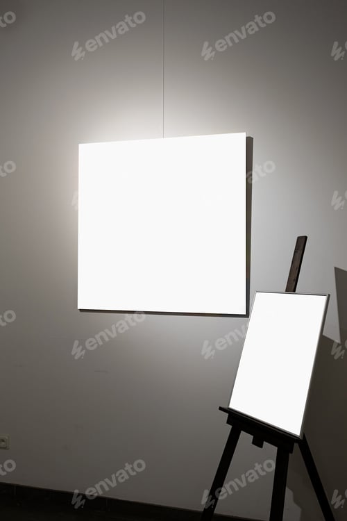 Preview: Blank picture frames on grey wall with glowing lamp, mock up