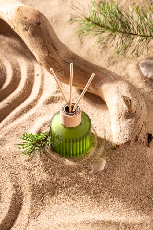 Preview: Fresh fragrance diffuser on sandy beach in summer.