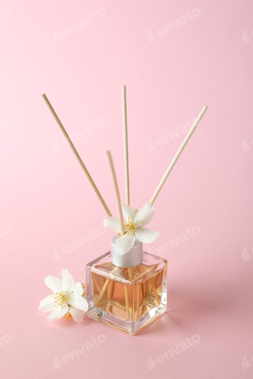 Preview: Aroma scent diffuser and flowers on pink background