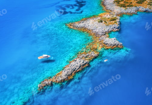 Preview: Aerial view of beautiful yacht and boat on the sea bay at sunset