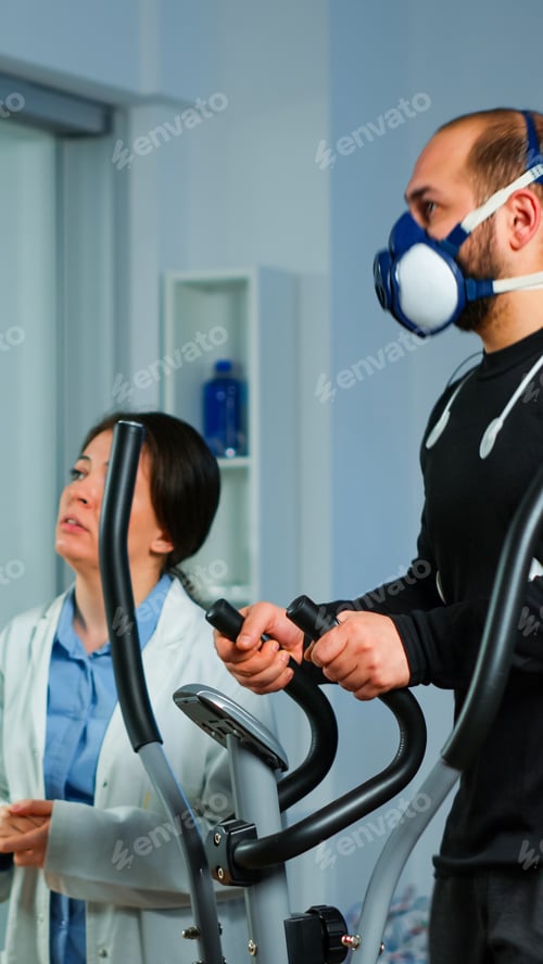 Preview: Medical researcher talking with sportsman and showing EKG scan on virtual screen