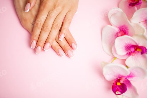 Preview: Woman applying hand cream at home, closeup
