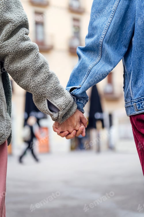 Preview: closeup of the hands of a couple of gay men