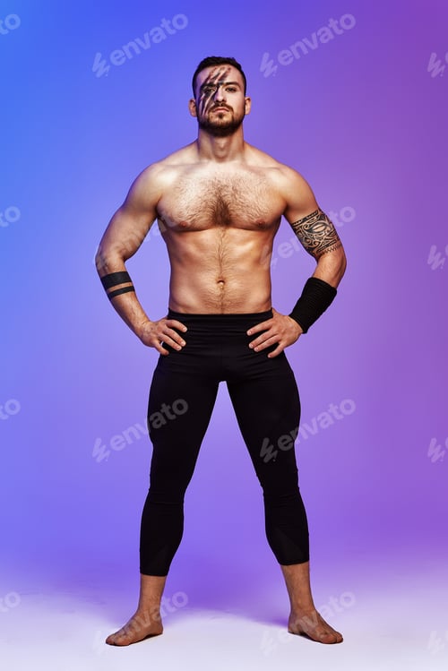 Preview: Animal instinct fitness instructor sportsman showing his incredible flexibility with an animal flow