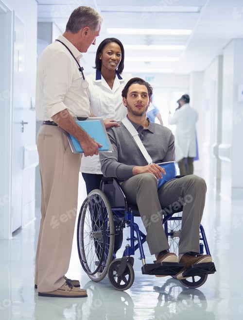 Preview: Doctor consulting with man in wheelchair with arm sling