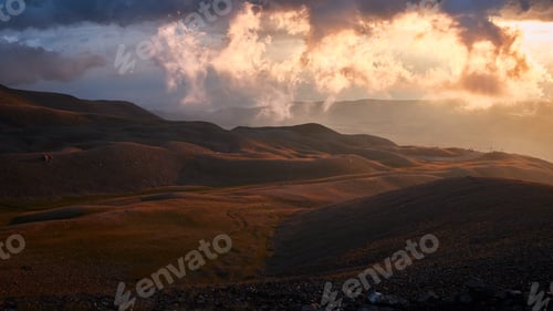 Preview: Beautiful shot of empty hills under a cloudy sky