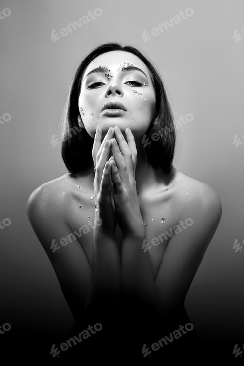 Preview: Perfect makeup, skin care, professional cosmetics. Art portrait of a woman with large crystals