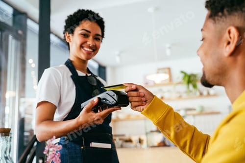 Preview: Barista working in a bar cafeteria