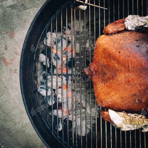 Preview: Smoked turkey on bbq grill during the holidays