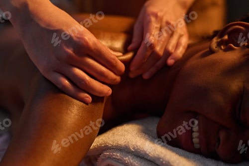 Preview: Unrecognizable Masseuse Using Petrissage Technique