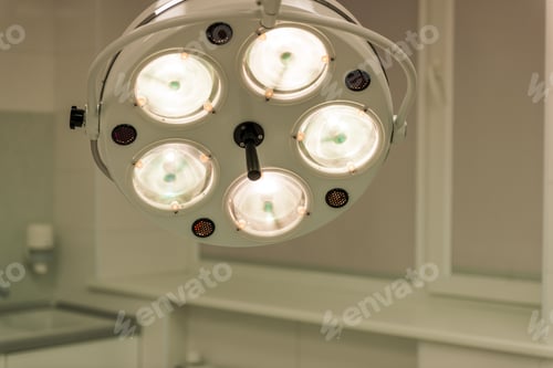 Preview: Bright Surgical Lights in a Hospital Room
