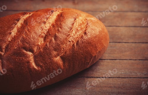Preview: Delicious bread on a wood table