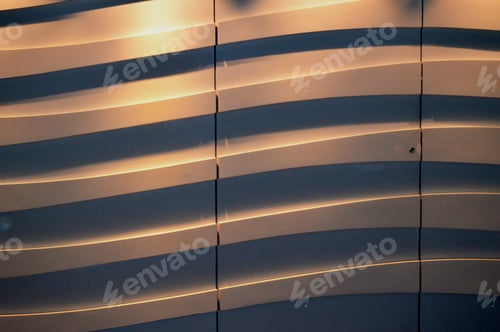 Preview: Mysterious futuristic gold background in the form of curves with soft lighting with space for text,