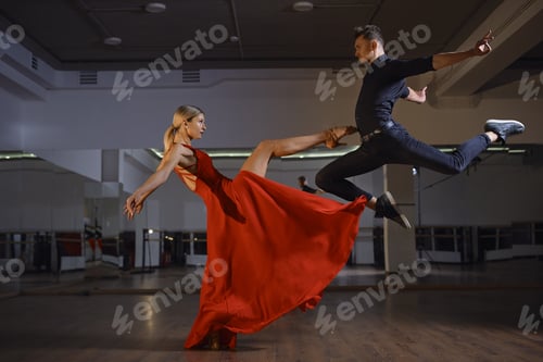 Ballroom Dancers Performing Dramatic Dance Moves in Studio