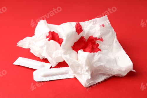 Preview: Concept of healthcare with hemorrhoids accessories on red background