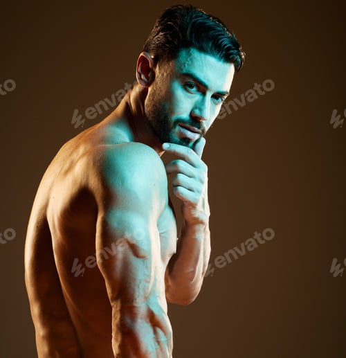 Preview: Sexy, muscular and portrait of a man in a studio with a hot, sensual and attractive pose. Seductive