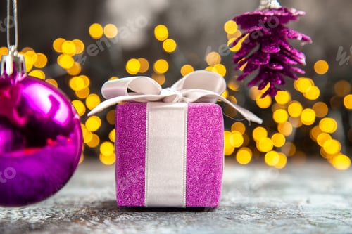 Preview: front view little xmas presents with toys and lights on light-dark background holiday gift new year