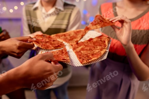 Preview: Close up of diverse Generation Z friends enjoying party in cozy house.