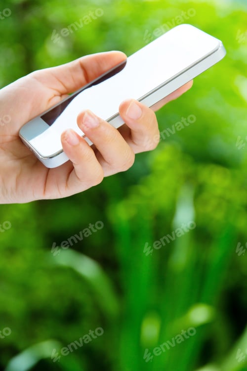 Preview: Girl hand holding a smart phone